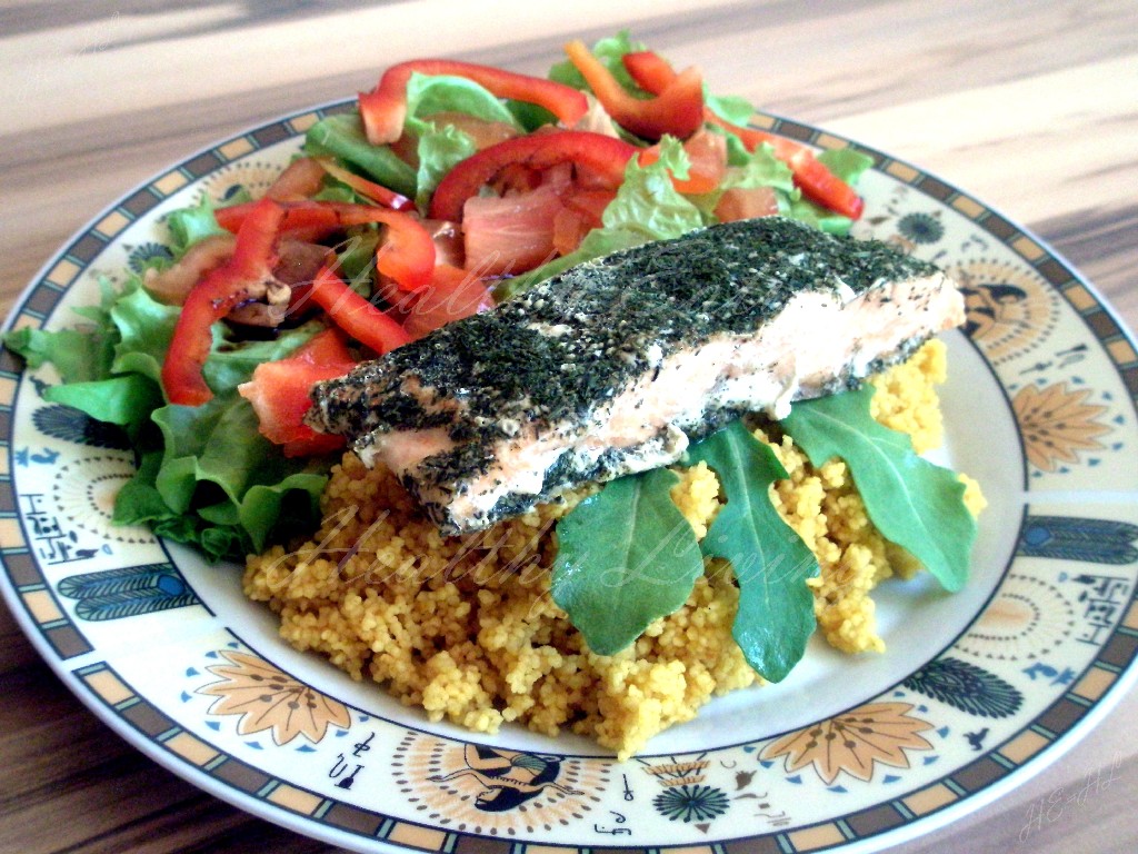 Baked salmon with couscous and vegetable salad