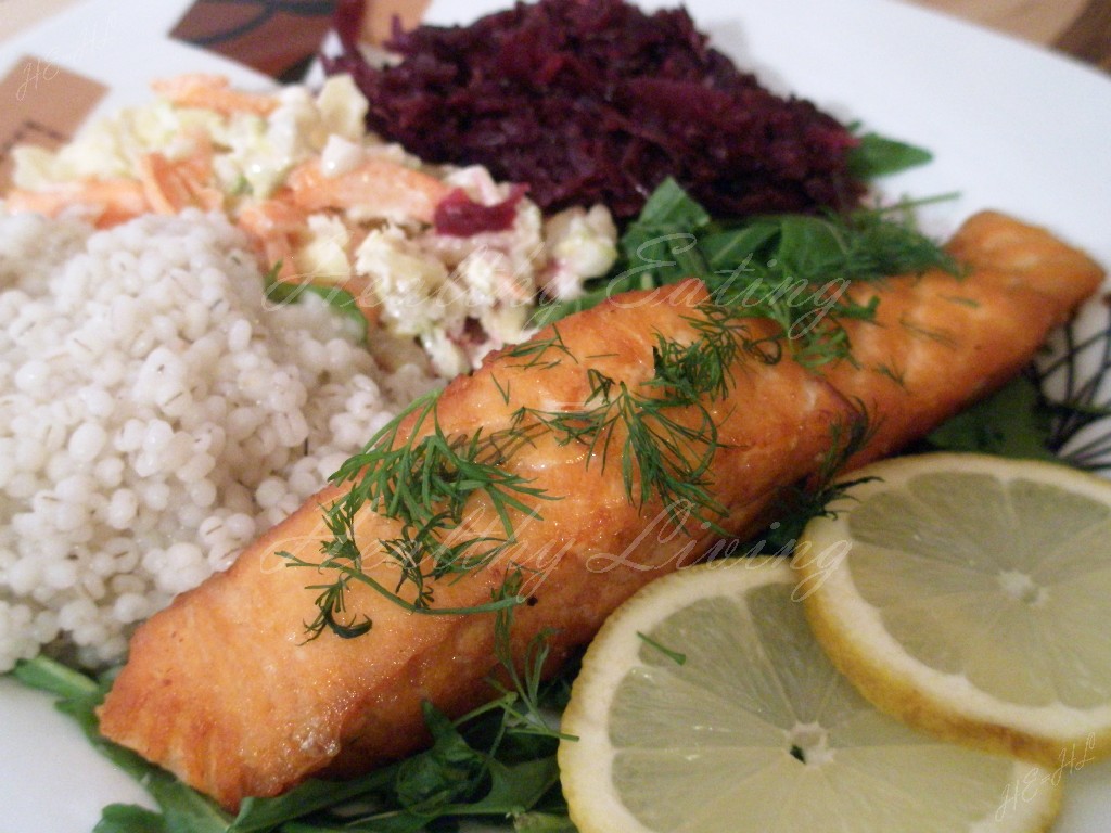 Grilled salmon on arugula with pearl barley