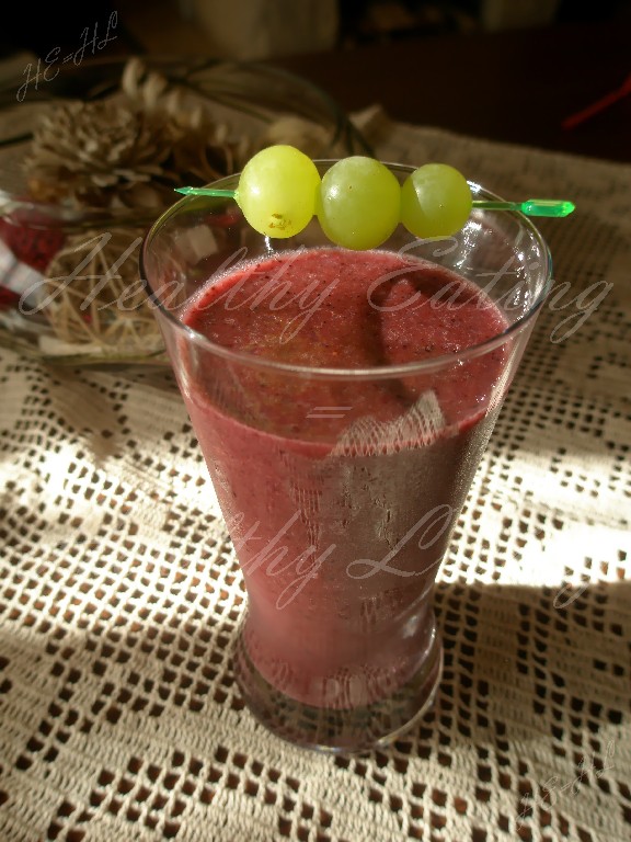 Cocktail with almond milk and fruit