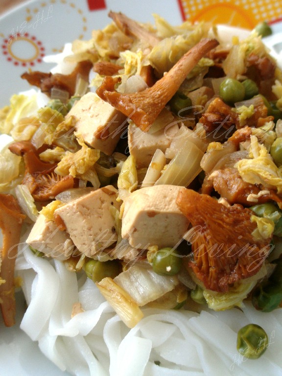 Tofu with peas, chanterelle, and napa cabbage