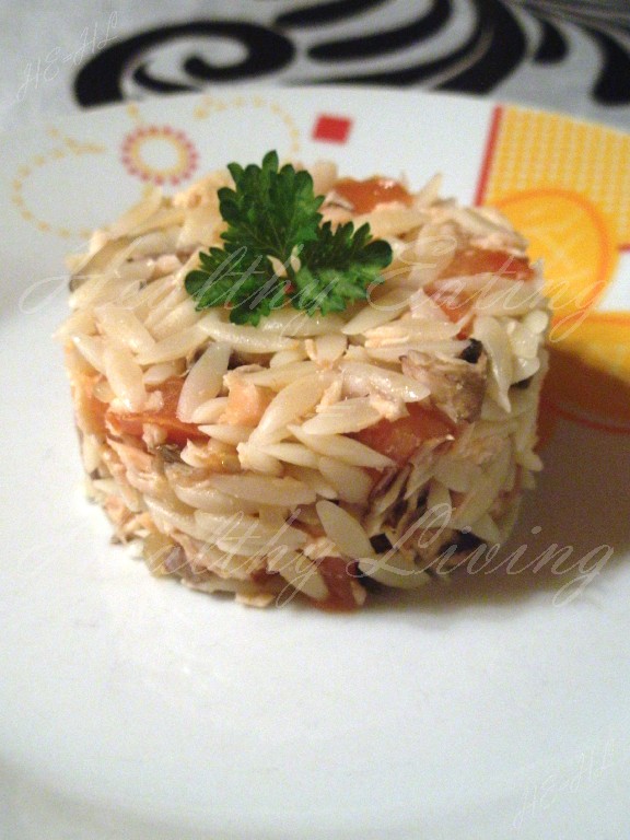 Salad with mushrooms, salmon and orzo pasta