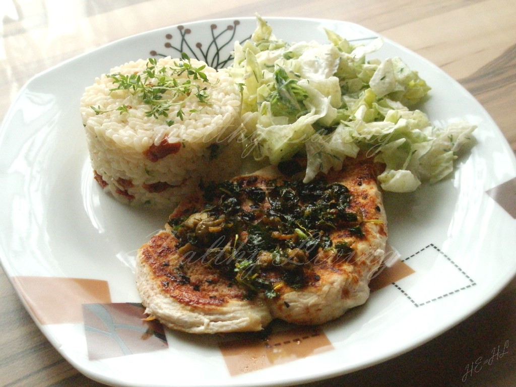 Grilled chicken breast with stewed mint, and risotto with sun-dried tomatoes