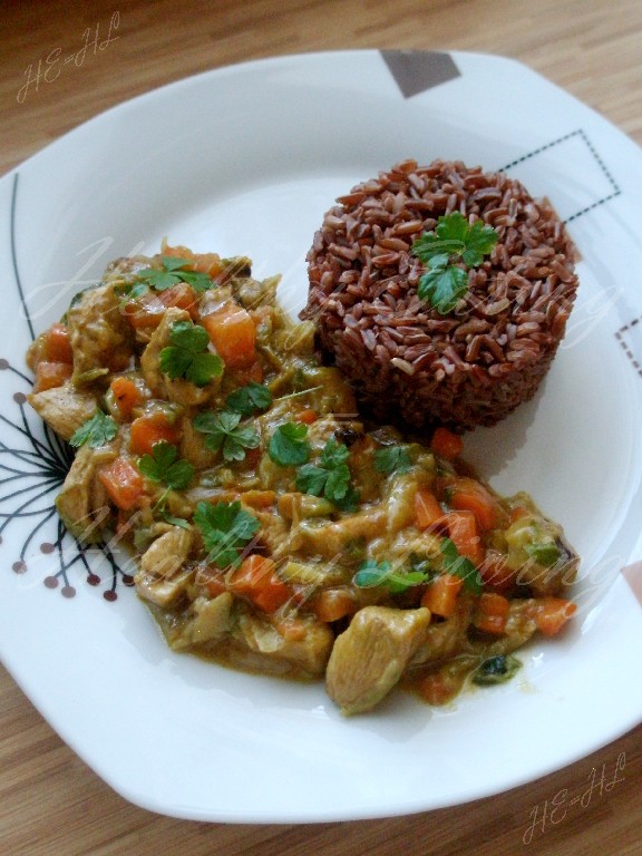 Chicken in coconut milk on red rice