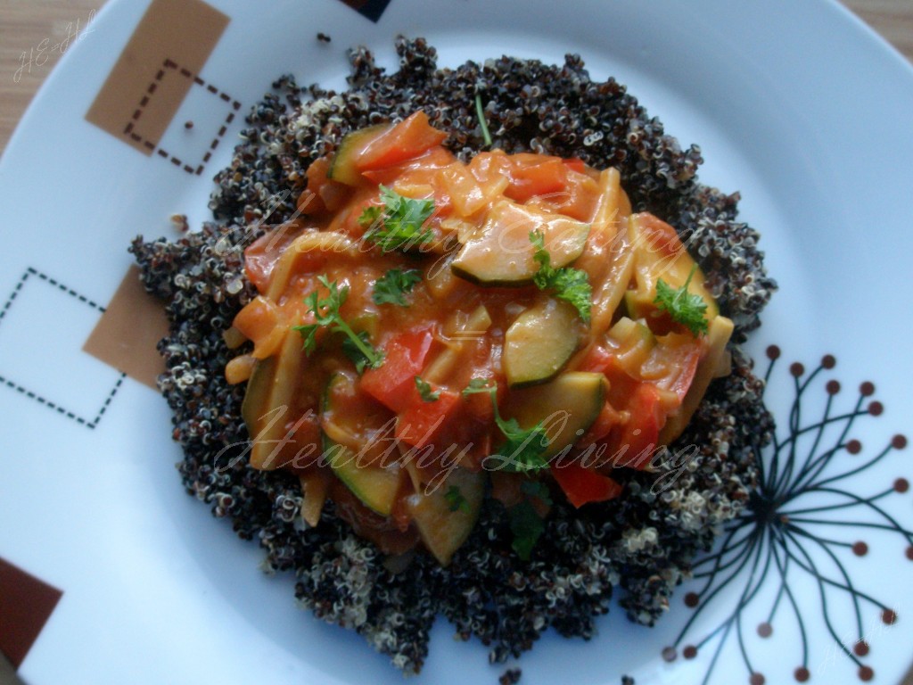 Black quinoa with vegetables stewed in coconut milk