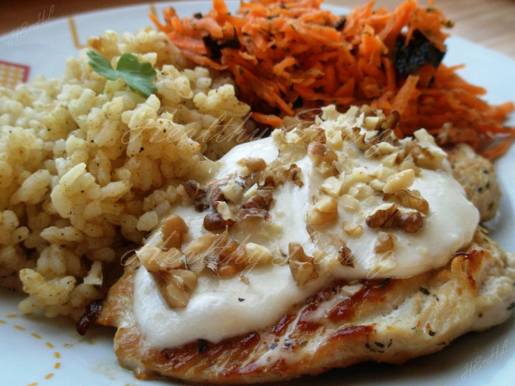 Chicken breast with lemon rice and carrot salad