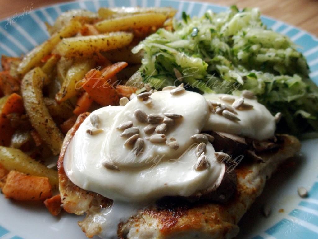 Grilled chicken breast with brown mushrooms and zucchini salad