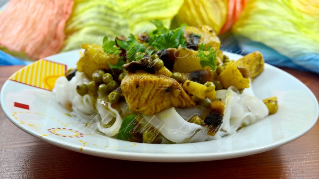 Sour-sweet chicken with pineapple and pattypan