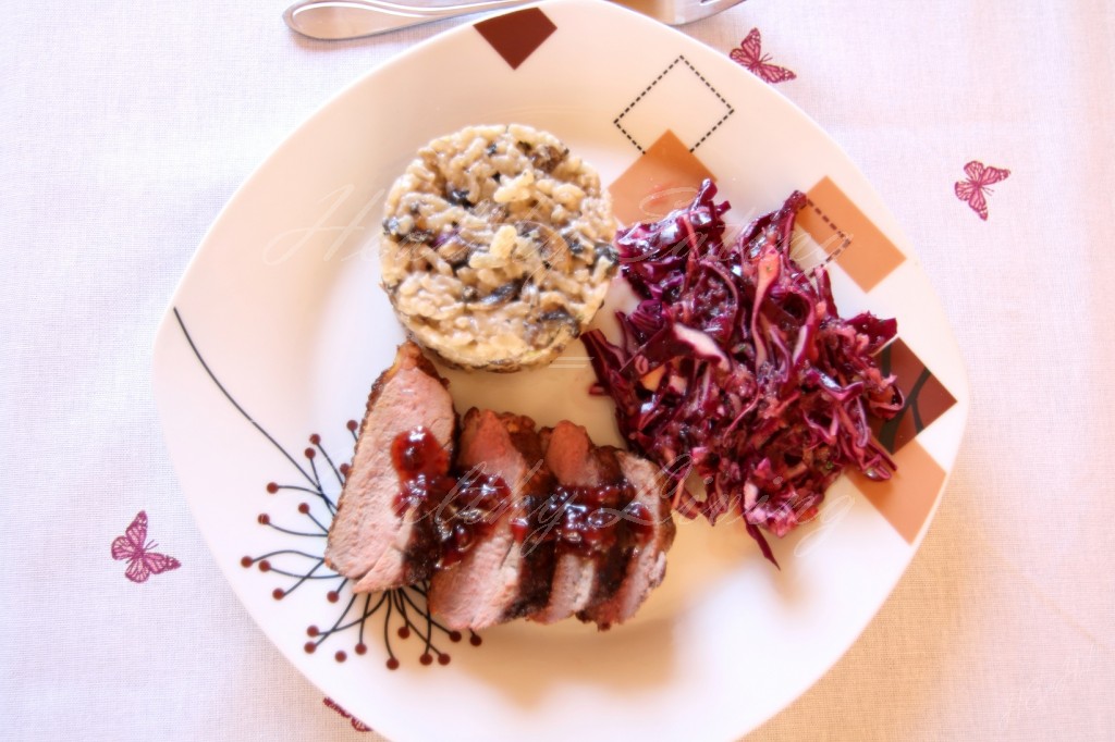 Grilled duck breast with mushrooms risotto