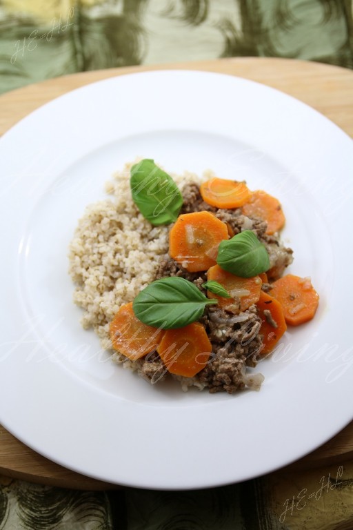 Stewed beef served with carrot and barley groats